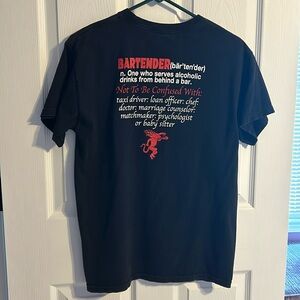 Alstyle Men’s black t-shirt, size M, has logo for Fireball cinnamon whisky